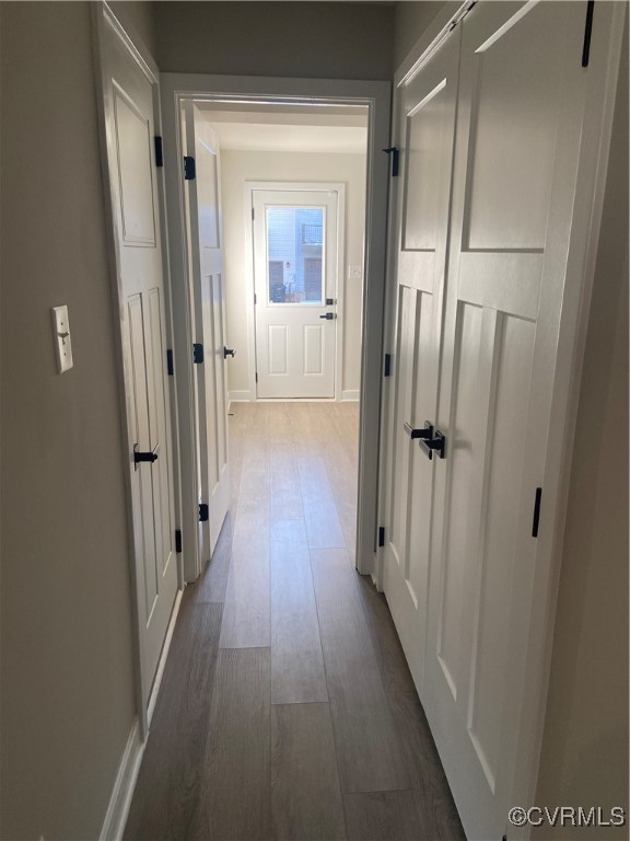 14031 Millpointe Road, Unit 15C Midlothian, VA 23114 - Photo 3 of 17 a view of a hallway with wooden floor