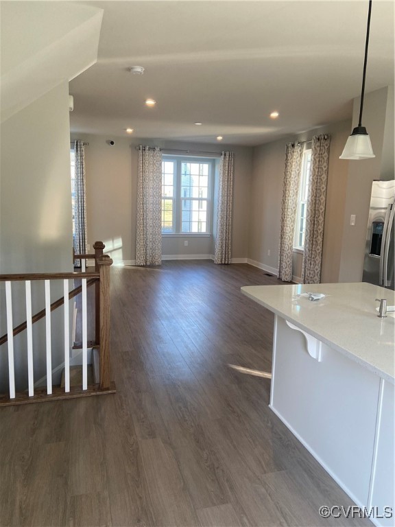 14031 Millpointe Road, Unit 15C Midlothian, VA 23114 - Photo 6 of 17 a view of a big room with wooden floor and windows
