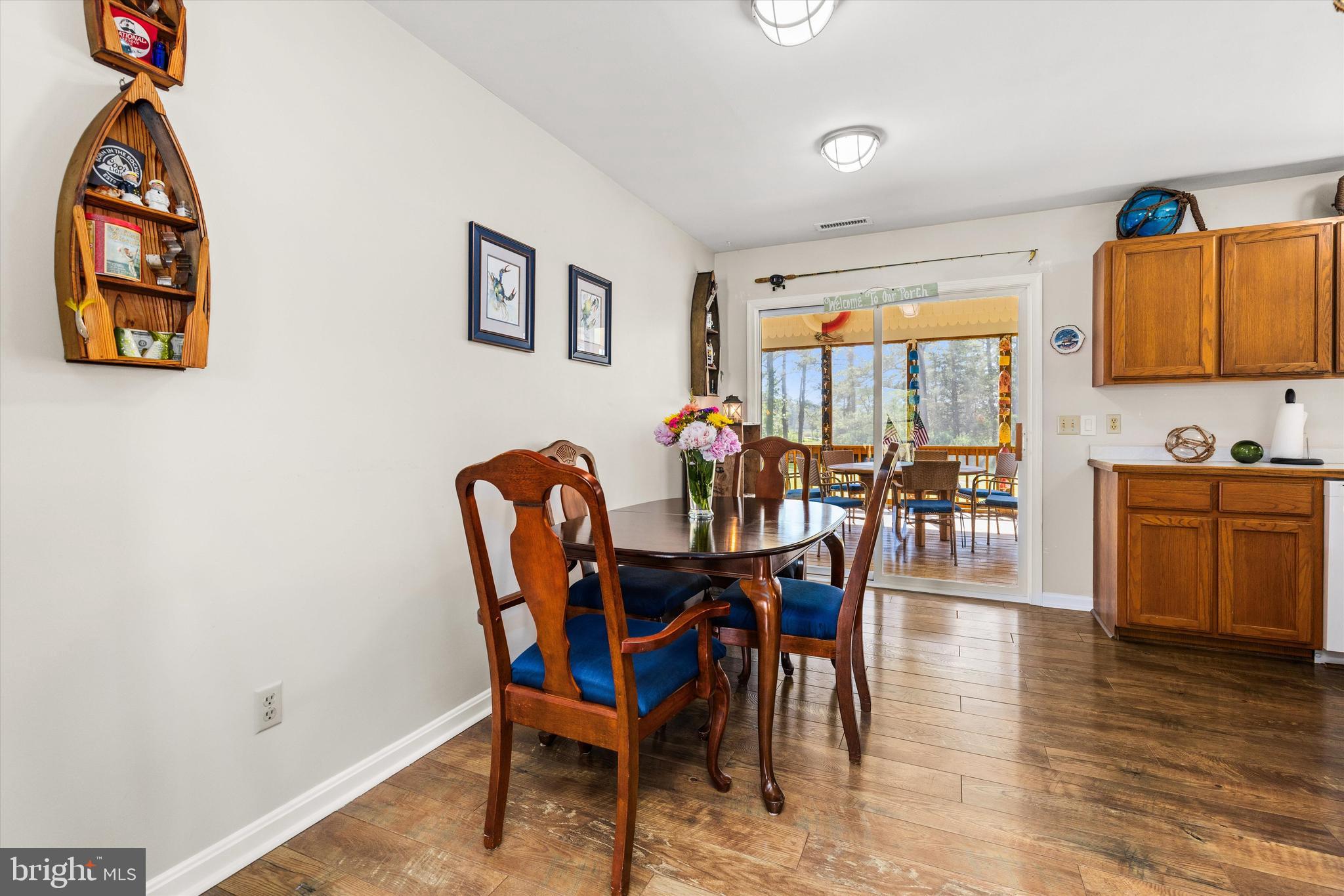 3620 Country Club Road Crisfield, MD 21817 - Photo 19 of 62 a dining room with furniture and wooden floor