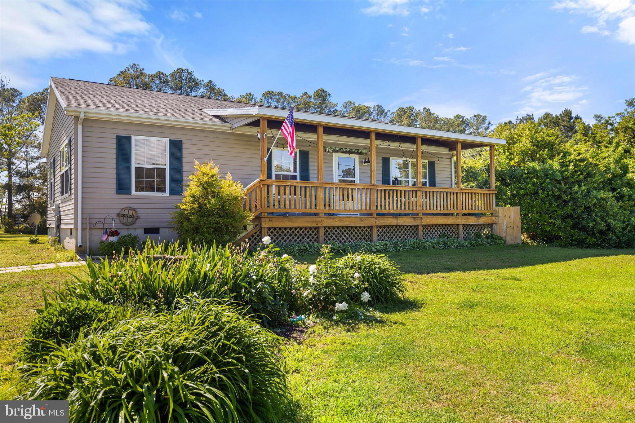 3620 Country Club Road Crisfield, MD 21817 - Photo 4 of 62 a front view of a house with a yard