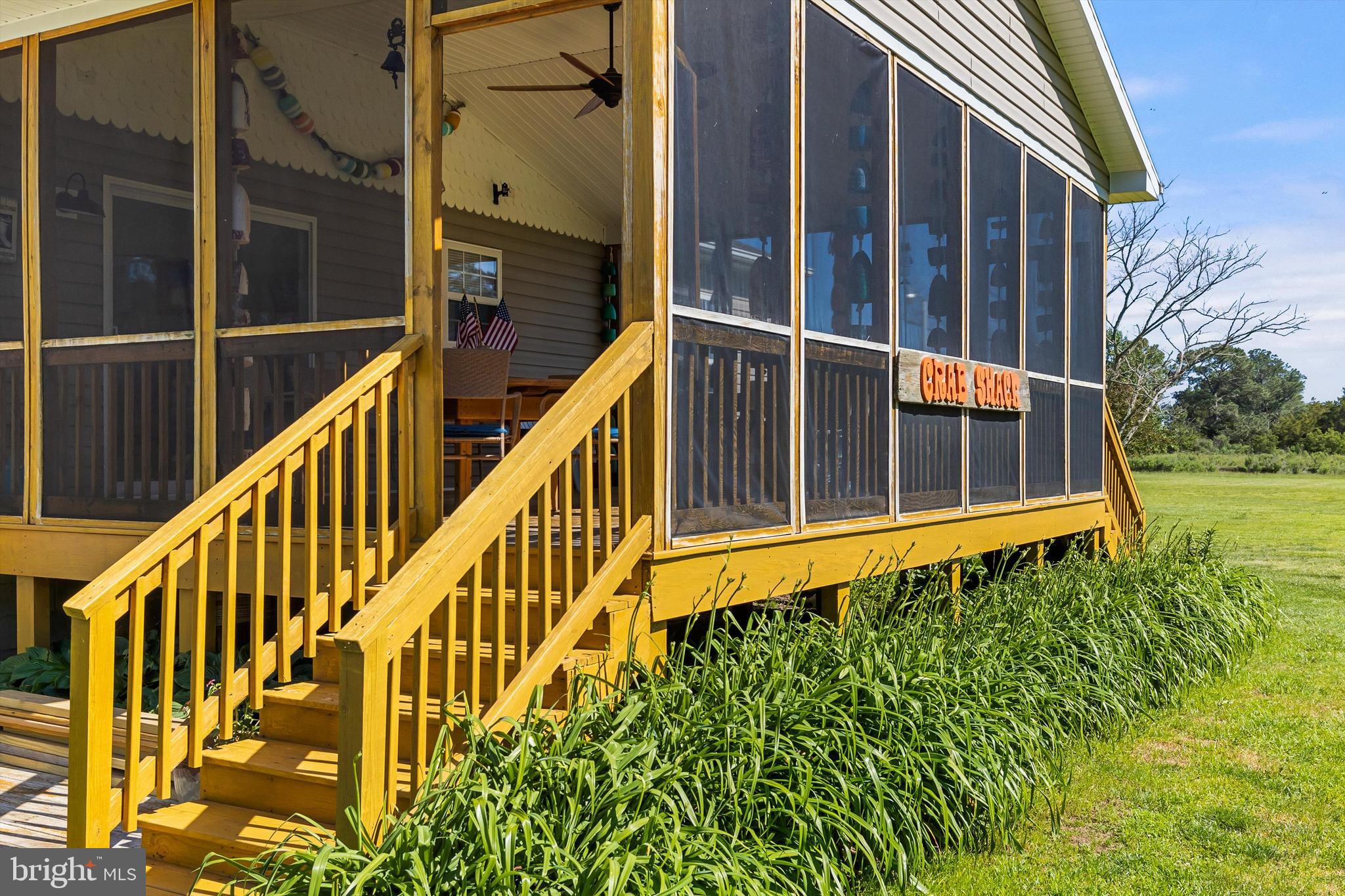3620 Country Club Road Crisfield, MD 21817 - Photo 9 of 62 a view of a house with a large window
