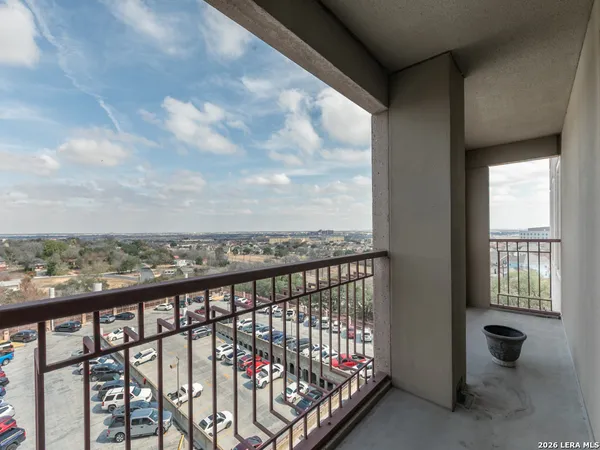 a view of a balcony with an outdoor space