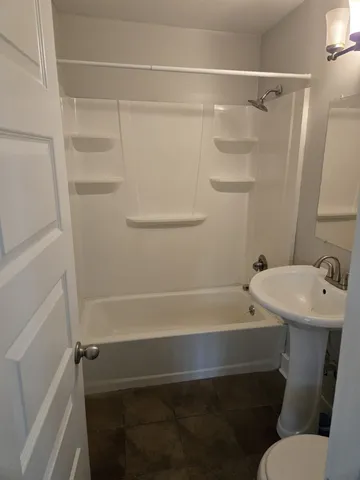 a bathroom with a sink and a toilet
