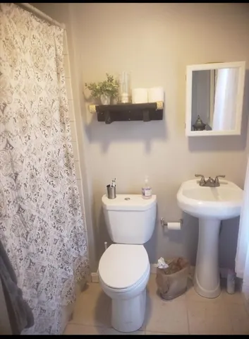 a bathroom with a sink and a toilet