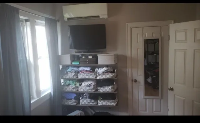 a living room with a flat screen tv