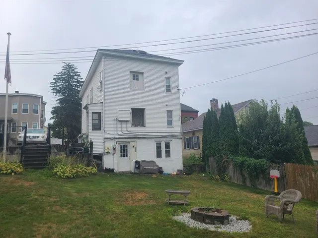a view of a yard in front of a house