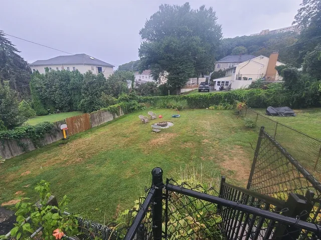 a view of a lake from a balcony