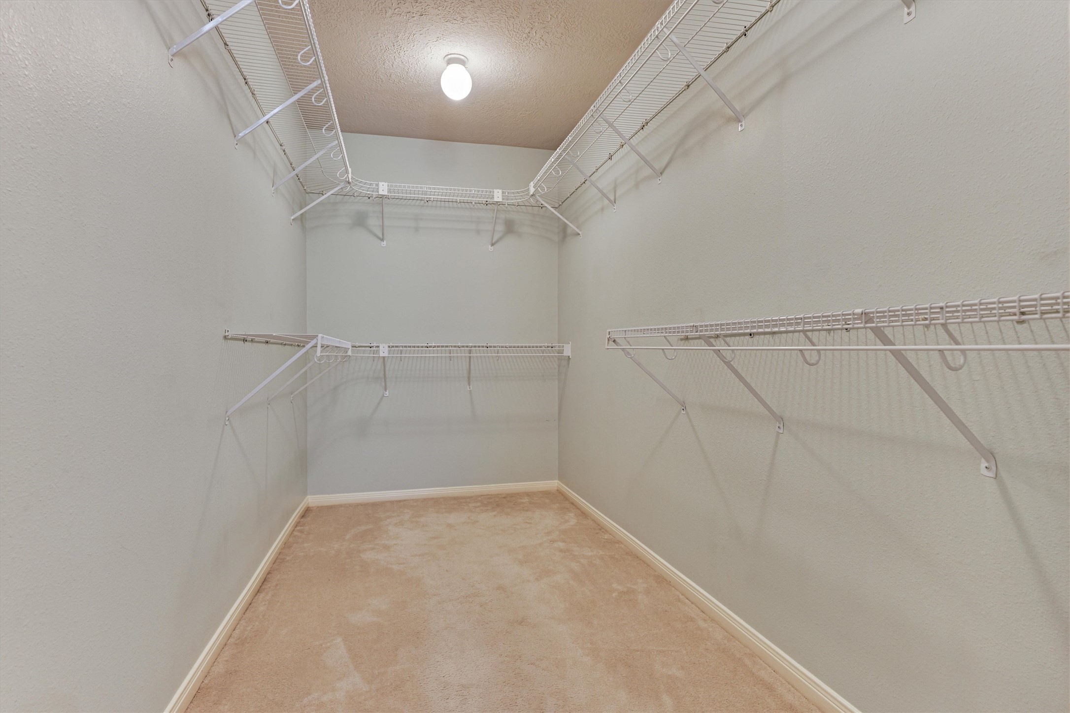 930 Arbor Pine Tomball, TX 77375 - Photo 30 of 45 a view of a room with racks on the wall