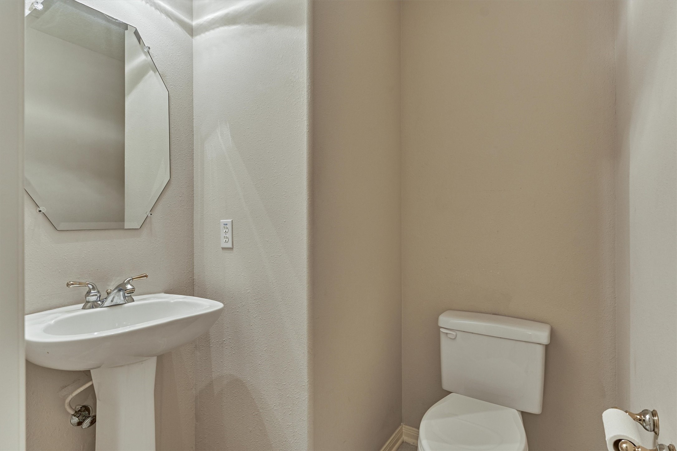 930 Arbor Pine Tomball, TX 77375 - Photo 32 of 45 a bathroom with a toilet sink and mirror