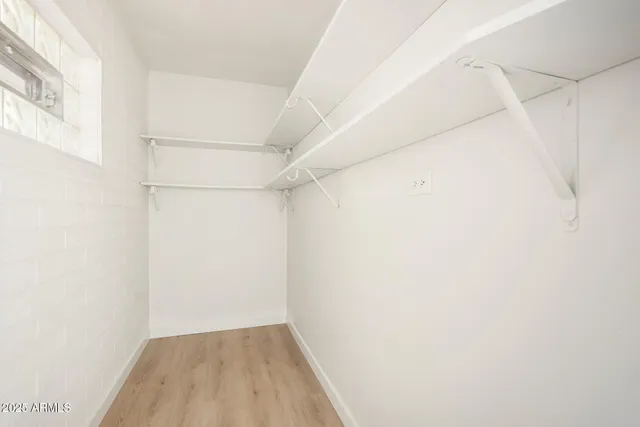 a view of small space with racks on the wall