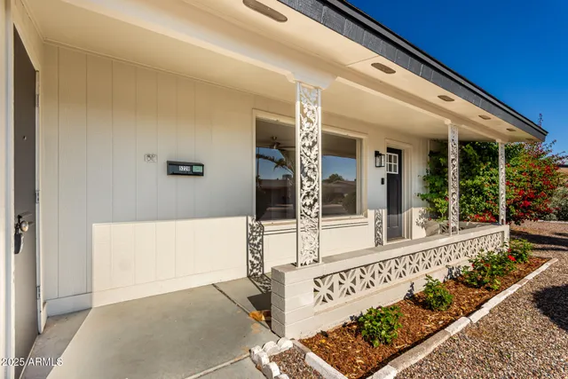 front view of a house with large windows