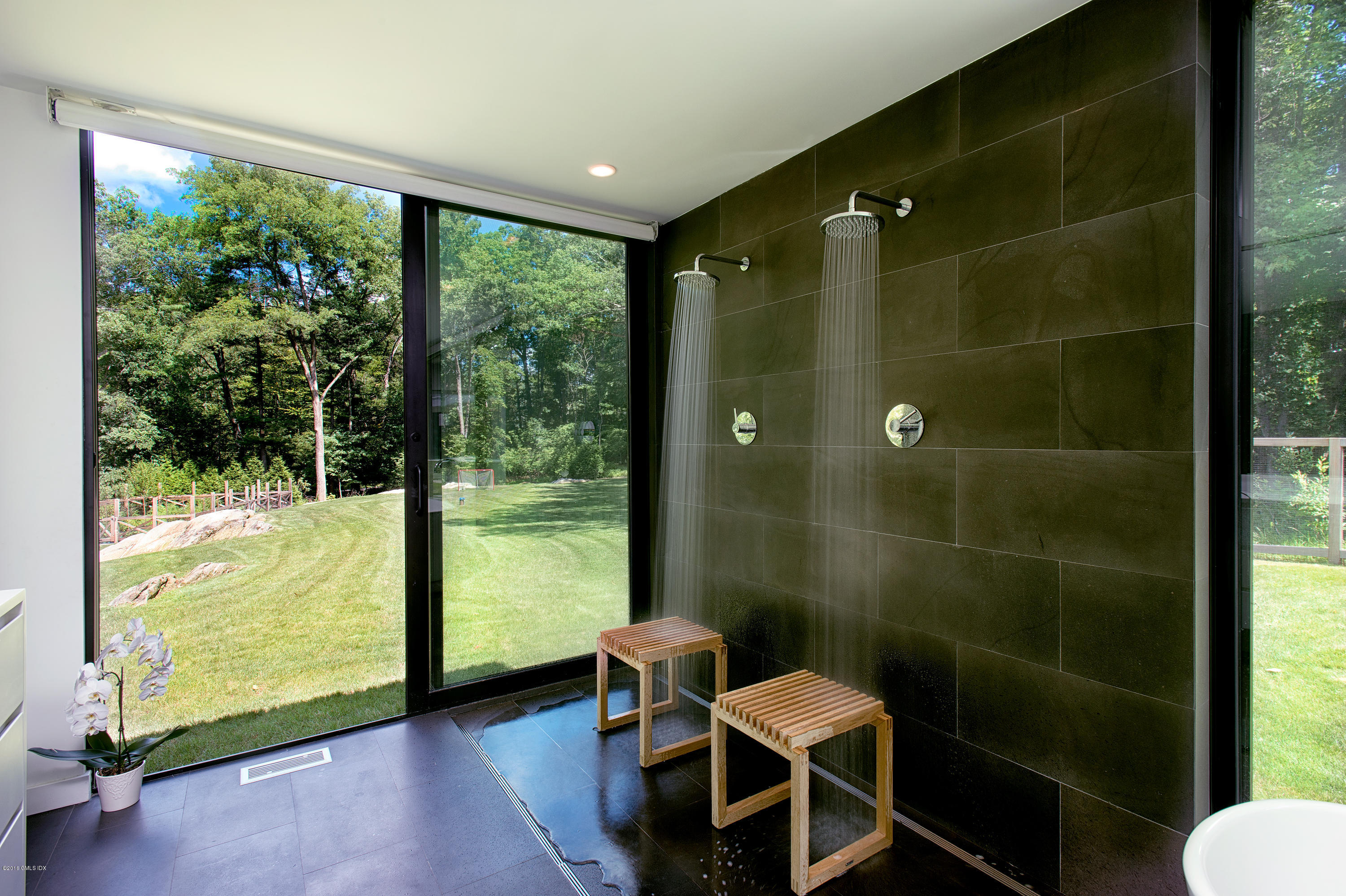 59 Dingletown Road Greenwich, CT 06830 - Photo 14 of 28 a bathroom with a toilet and a shower