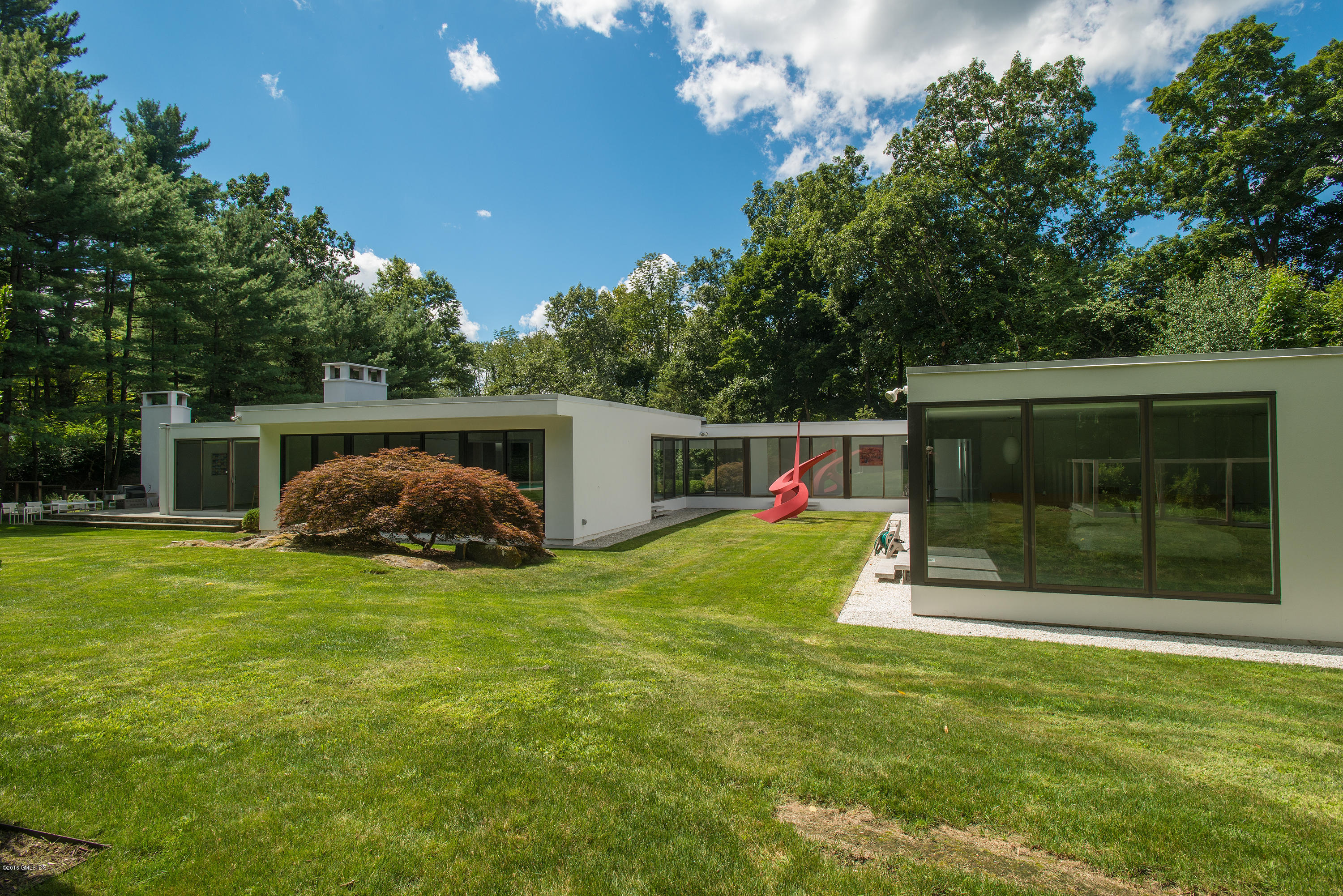 59 Dingletown Road Greenwich, CT 06830 - Photo 18 of 28 a view of a house with backyard and garden