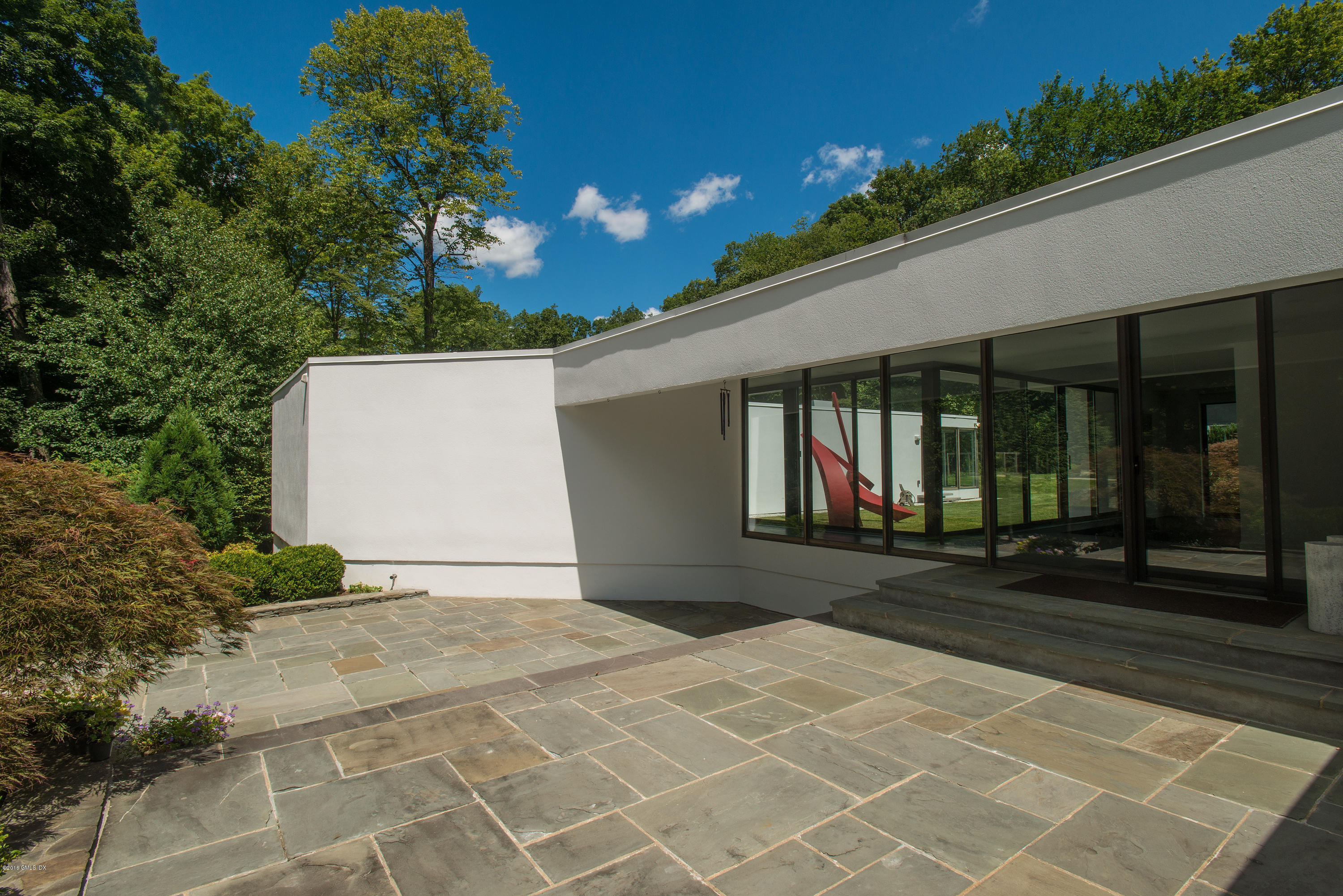 59 Dingletown Road Greenwich, CT 06830 - Photo 22 of 28 a front view of a house with garden