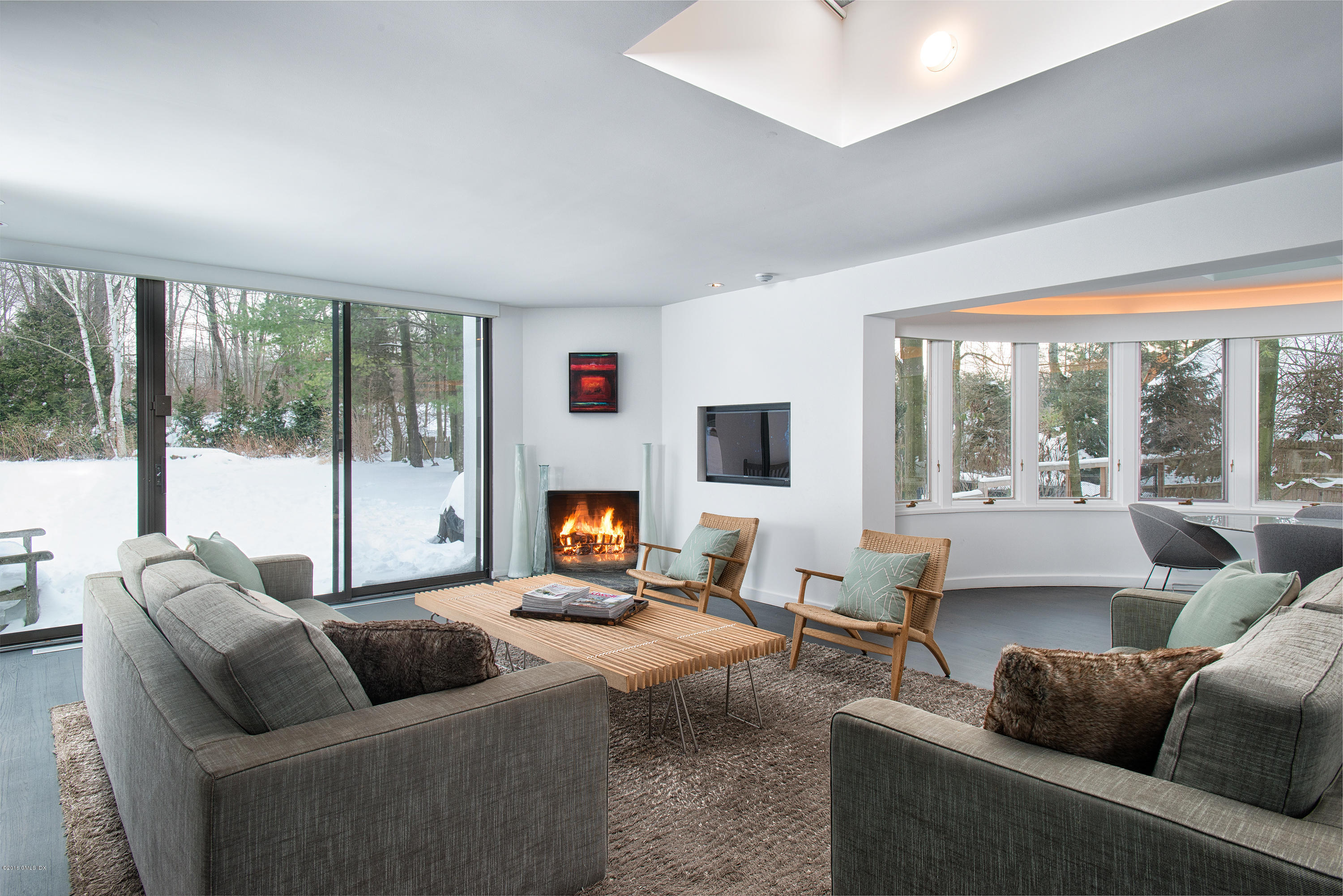 59 Dingletown Road Greenwich, CT 06830 - Photo 8 of 28 a living room with furniture and a large window