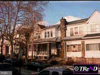 7225 Calvin Road Upper Darby, PA 19082 - Photo 1 of 1 a front view of a building with parking space