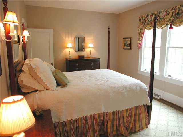 Main floor master bedroom has a walk-in closet and full bath en suite