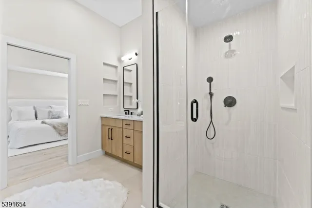 a spacious bathroom with a bathtub and a toilet