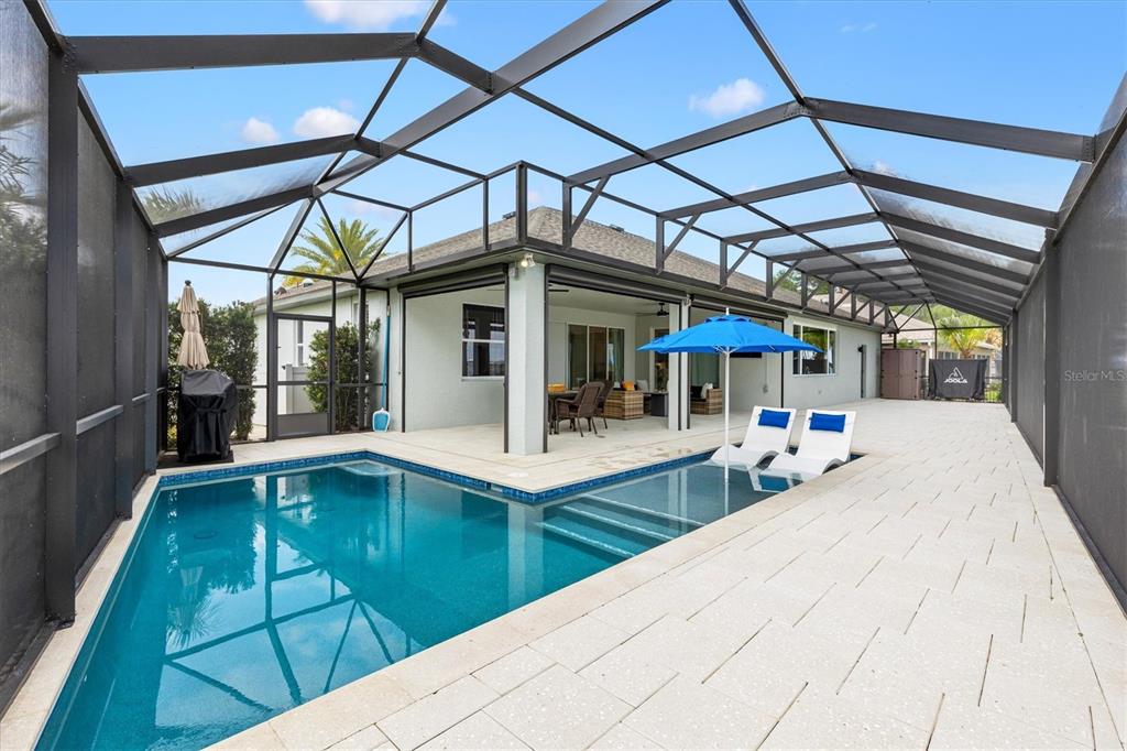 12114 Eagle Point Court Leesburg, FL 34788 - Photo 4 of 39 a view of swimming pool with a patio