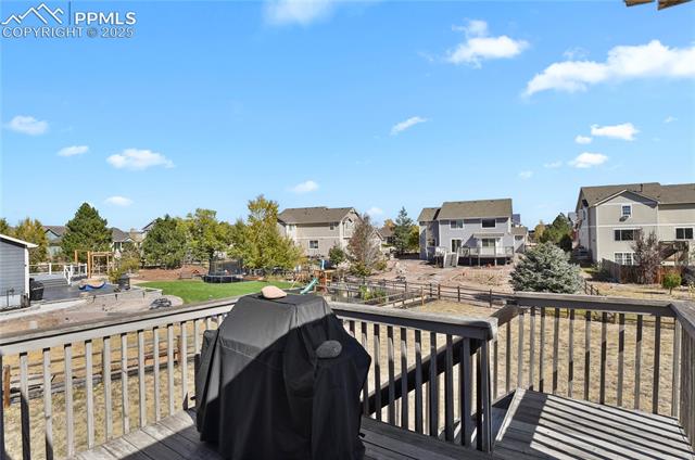 12237 Rio Secco Road Peyton, CO 80831 - Photo 39 of 45 Wood Deck with room for a grill and patio furniture