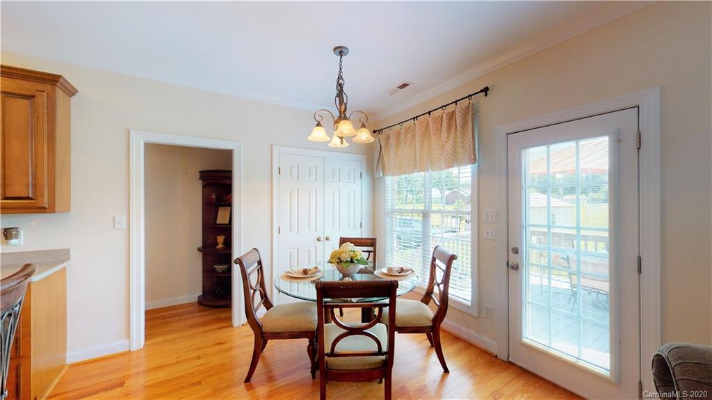 3812 Zebulon Williams Road Monroe, NC 28110 - Photo 15 of 31 a dining room with furniture window wooden floor