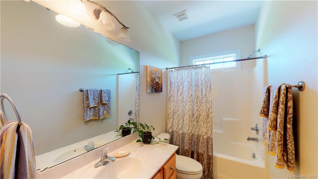 3812 Zebulon Williams Road Monroe, NC 28110 - Photo 19 of 31 a bathroom with a sink toilet and shower