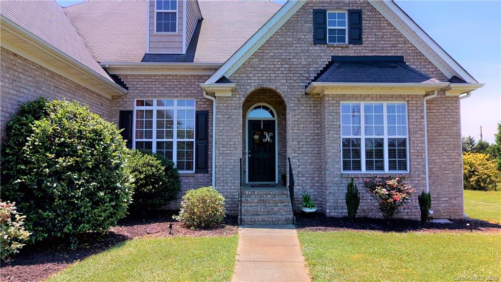 3812 Zebulon Williams Road Monroe, NC 28110 - Photo 3 of 31 a front view of a house with a yard