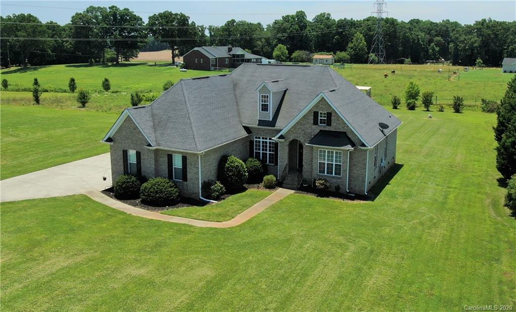 3812 Zebulon Williams Road Monroe, NC 28110 - Photo 24 of 31 a aerial view of a house with big yard and a garden