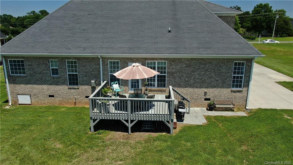 3812 Zebulon Williams Road Monroe, NC 28110 - Photo 27 of 31 a front view of a house with a garden and deck