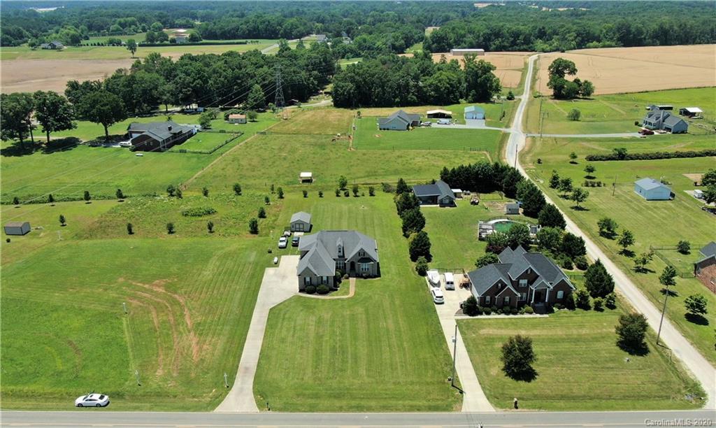 3812 Zebulon Williams Road Monroe, NC 28110 - Photo 30 of 31 a view of a green field