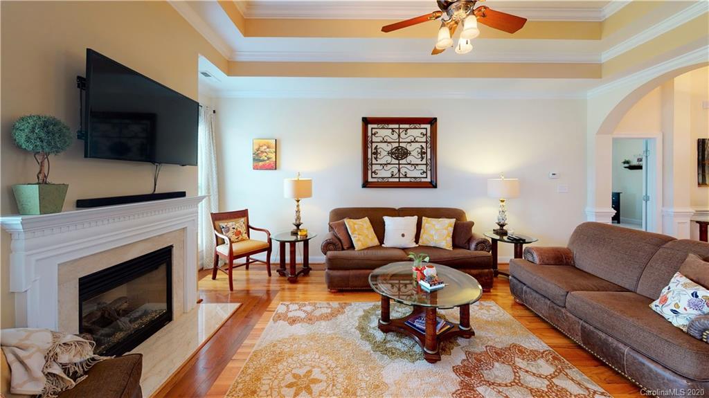 3812 Zebulon Williams Road Monroe, NC 28110 - Photo 4 of 31 a living room with furniture and a fireplace