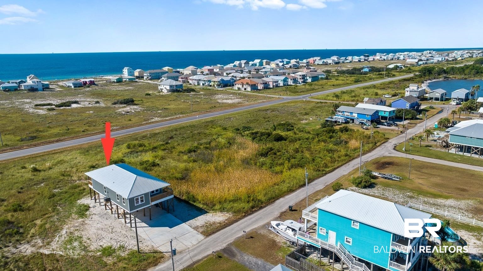 2586 Muscogee Road Gulf Shores, AL 36542 - Photo 52 of 55 Drone / aerial view featuring a water view