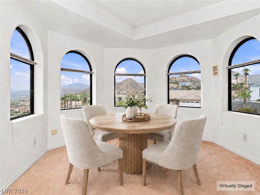 1068 Calico Ridge Drive Henderson, NV 89011 - Photo 16 of 38 Arched windows frame panoramic mountain views.