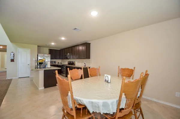 a view of a dining room with furniture