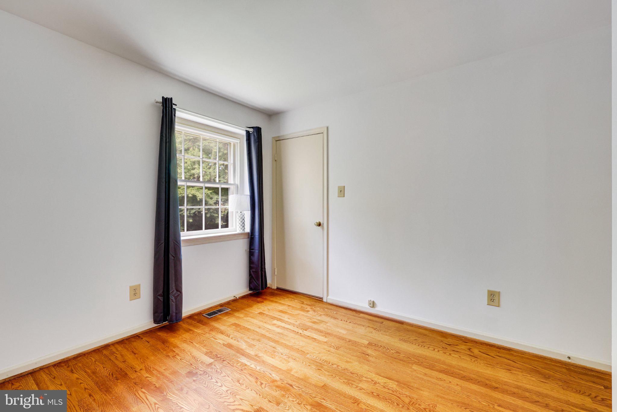 1427 Laurel Hill Road Vienna, VA 22182 - Photo 28 of 57 Bright and airy room with hardwood floors.