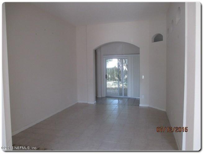12066 Spring Ridge Drive Jacksonville, FL 32258 - Photo 8 of 18 a view of a room that has a window