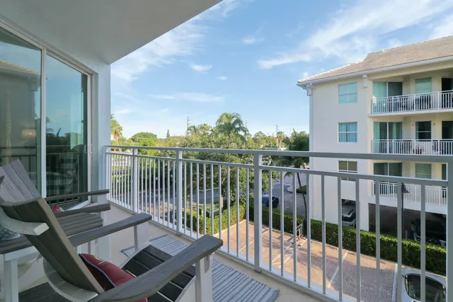 a view of a balcony with couch