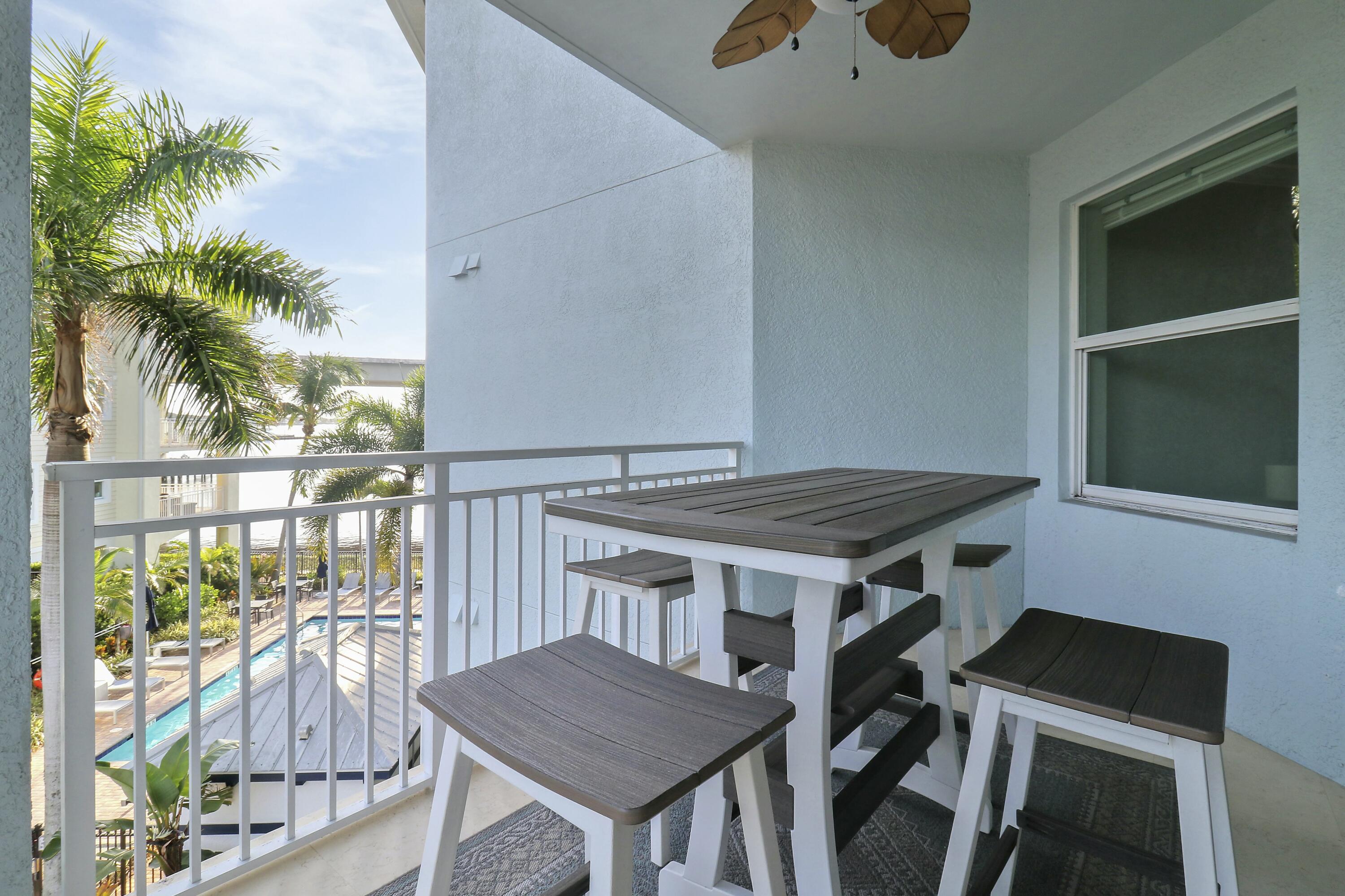 215 Northwest Flagler Avenue, Unit 301 Stuart, FL 34994 - Photo 28 of 34 a house view with a outdoor space