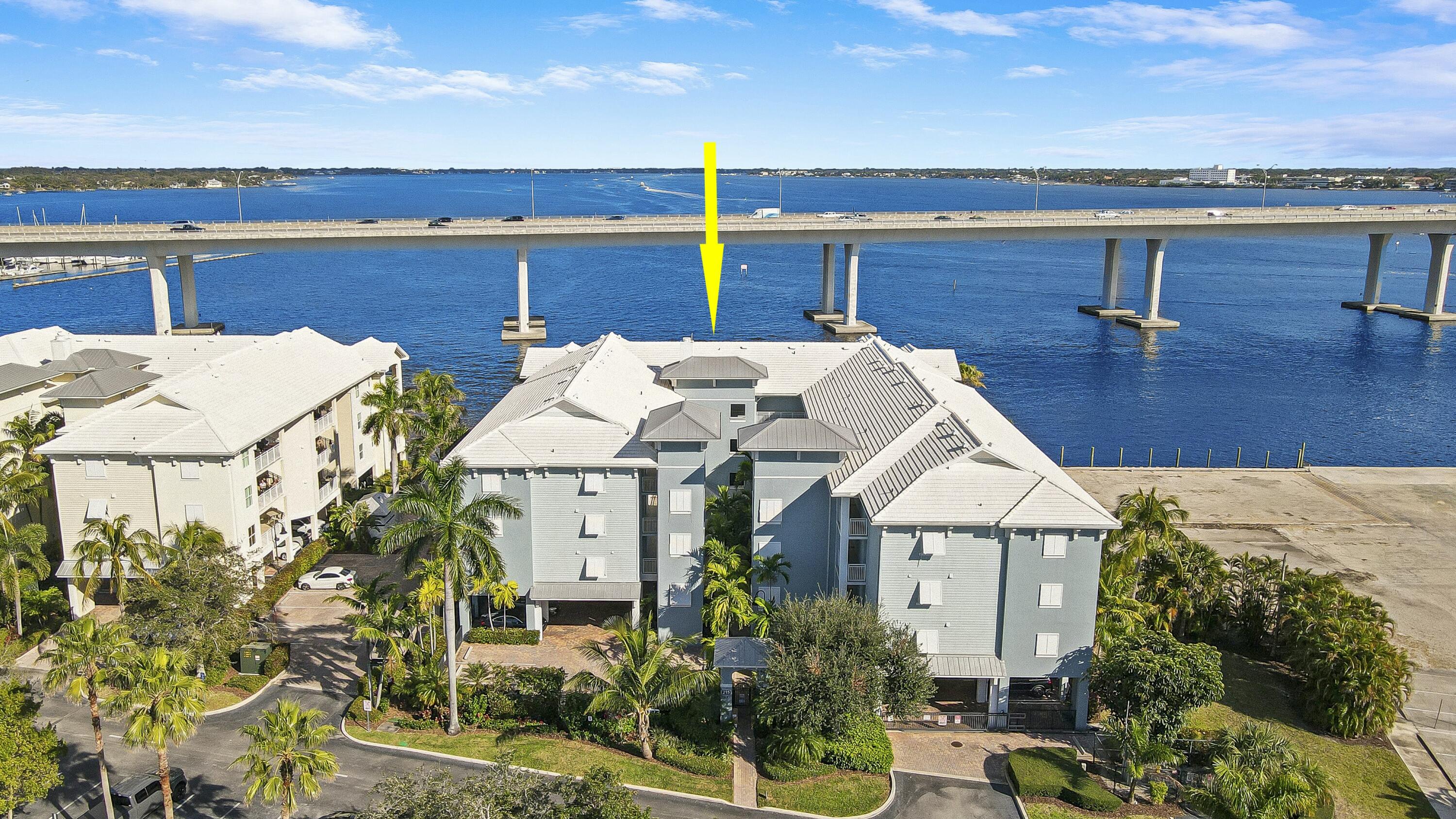 215 Northwest Flagler Avenue, Unit 301 Stuart, FL 34994 - Photo 3 of 34 a view of a house with a patio