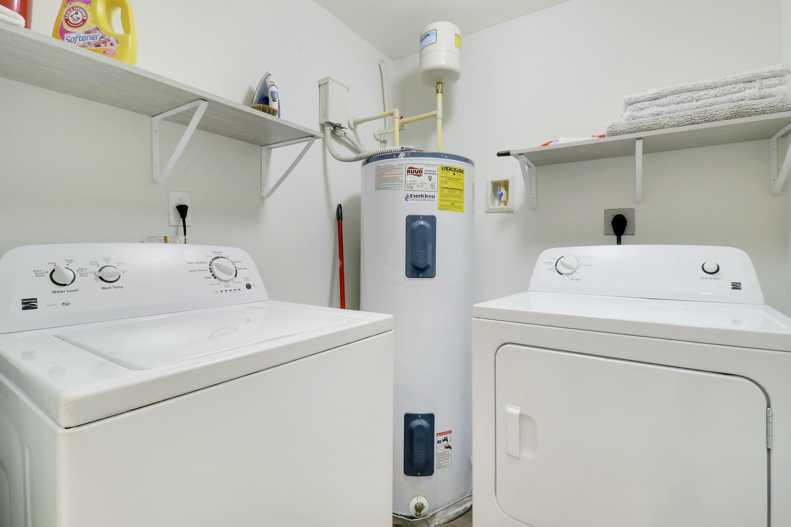 215 Northwest Flagler Avenue, Unit 301 Stuart, FL 34994 - Photo 34 of 34 a utility room with dryer and washer