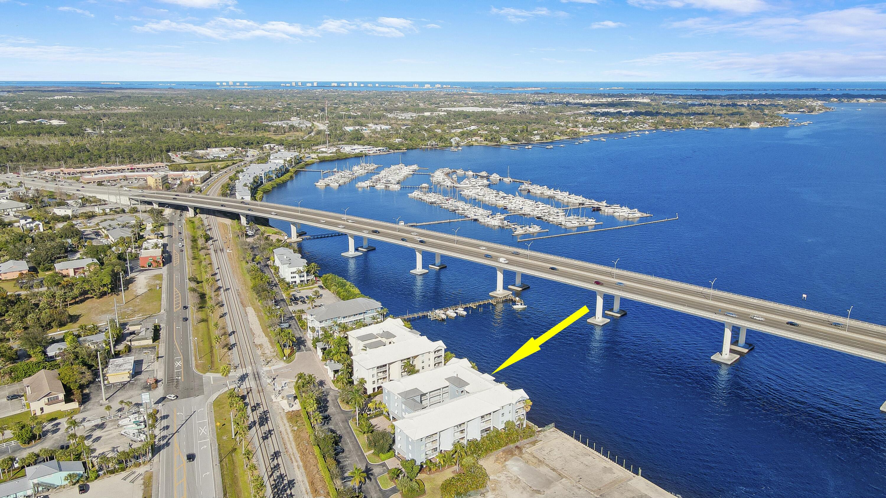 215 Northwest Flagler Avenue, Unit 301 Stuart, FL 34994 - Photo 4 of 34 a view of an ocean with beach
