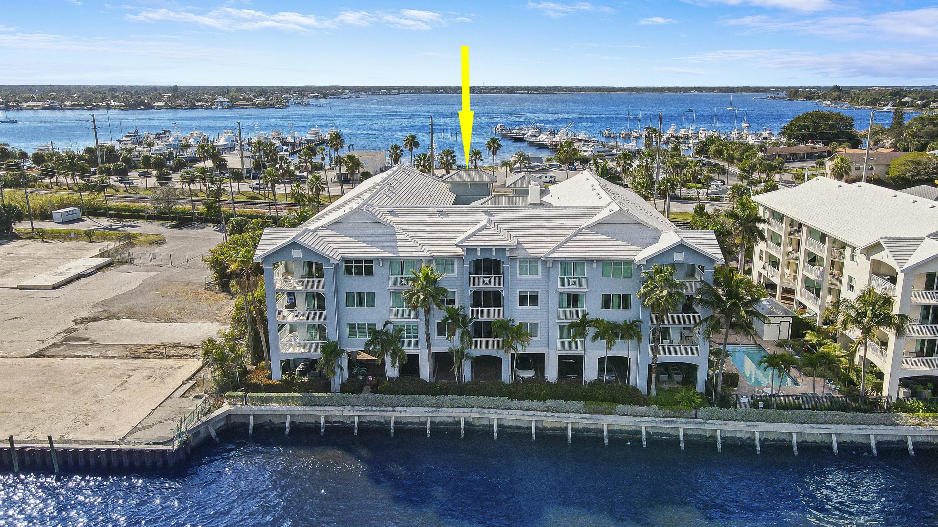 215 Northwest Flagler Avenue, Unit 301 Stuart, FL 34994 - Photo 6 of 34 an aerial view of multiple house