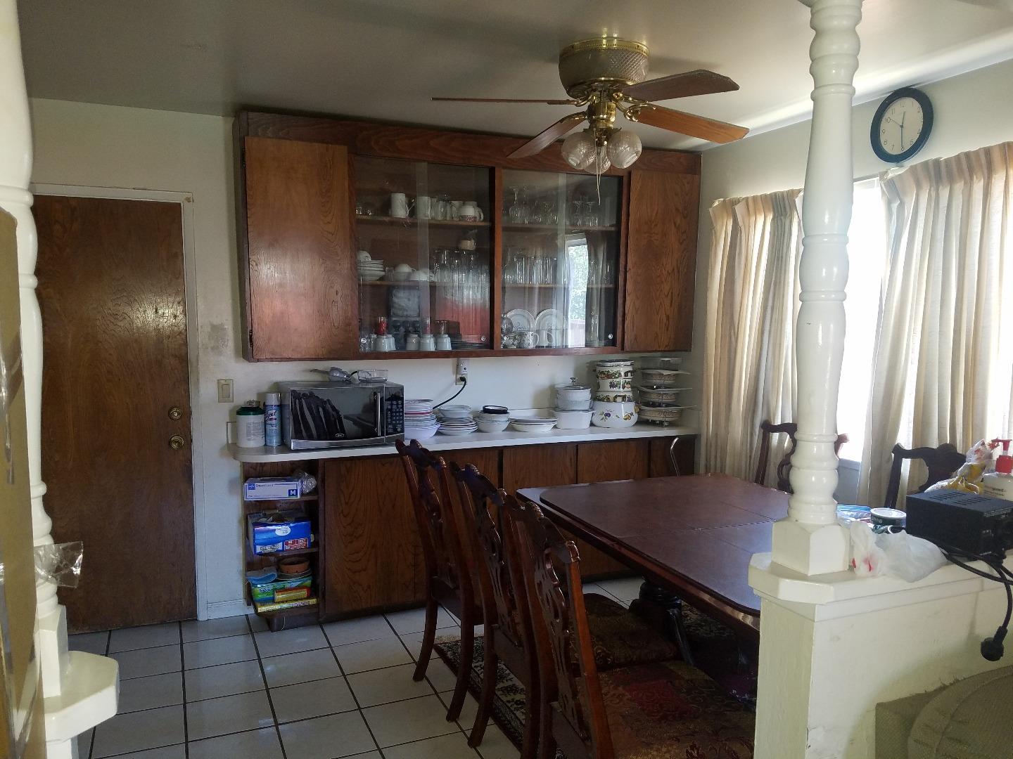 723 River Falls Drive San Jose, CA 95111 - Photo 12 of 20 a kitchen with stainless steel appliances a sink stove and cabinets