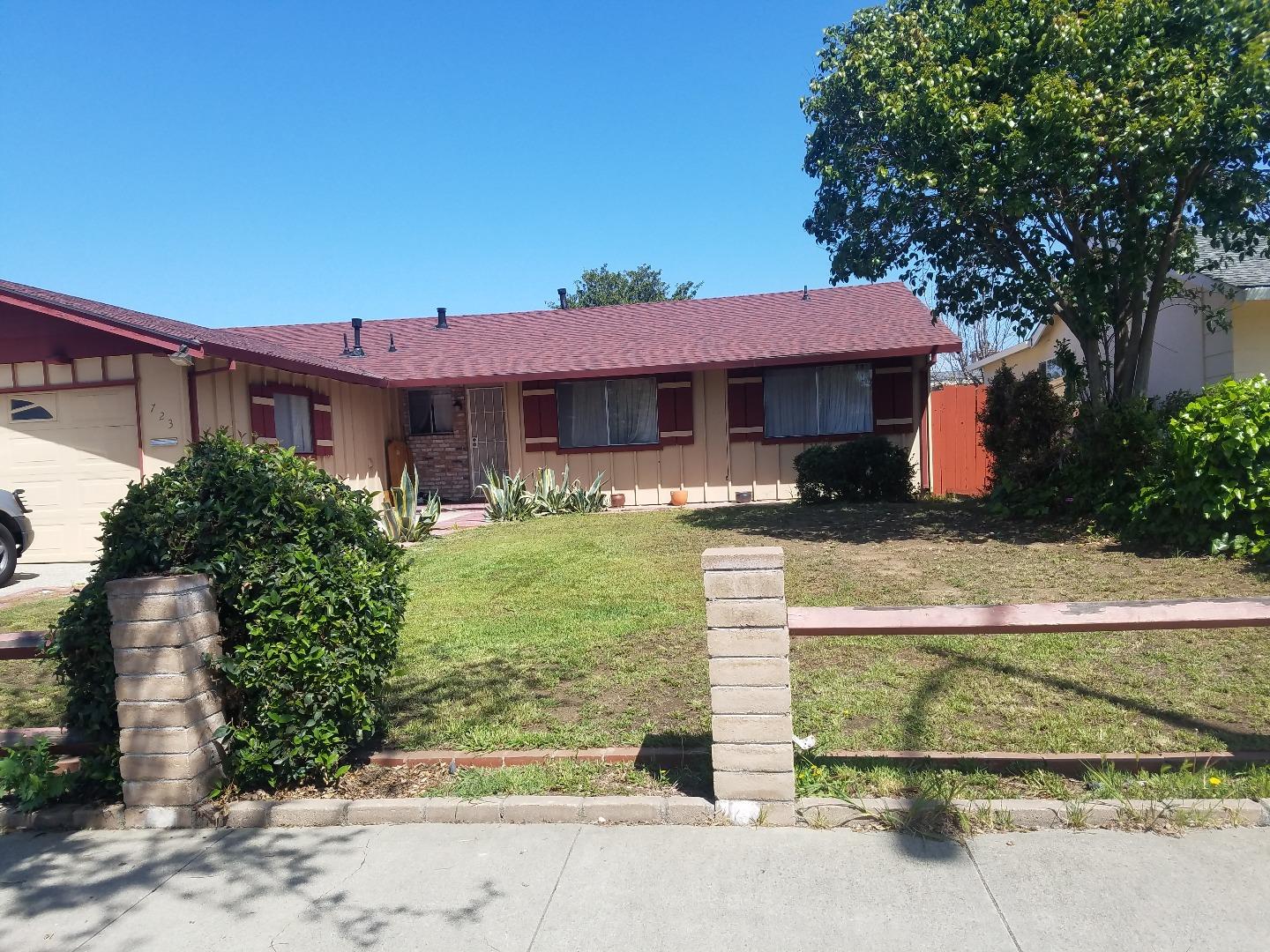 723 River Falls Drive San Jose, CA 95111 - Photo 2 of 20 a front view of a house with garden