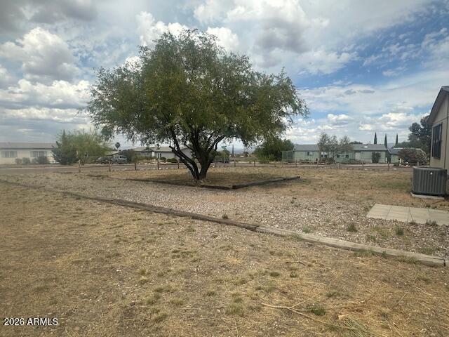 7258 South Lariat Road Hereford, AZ 85615 - Photo 29 of 37 a view of dirt yard with a large tree