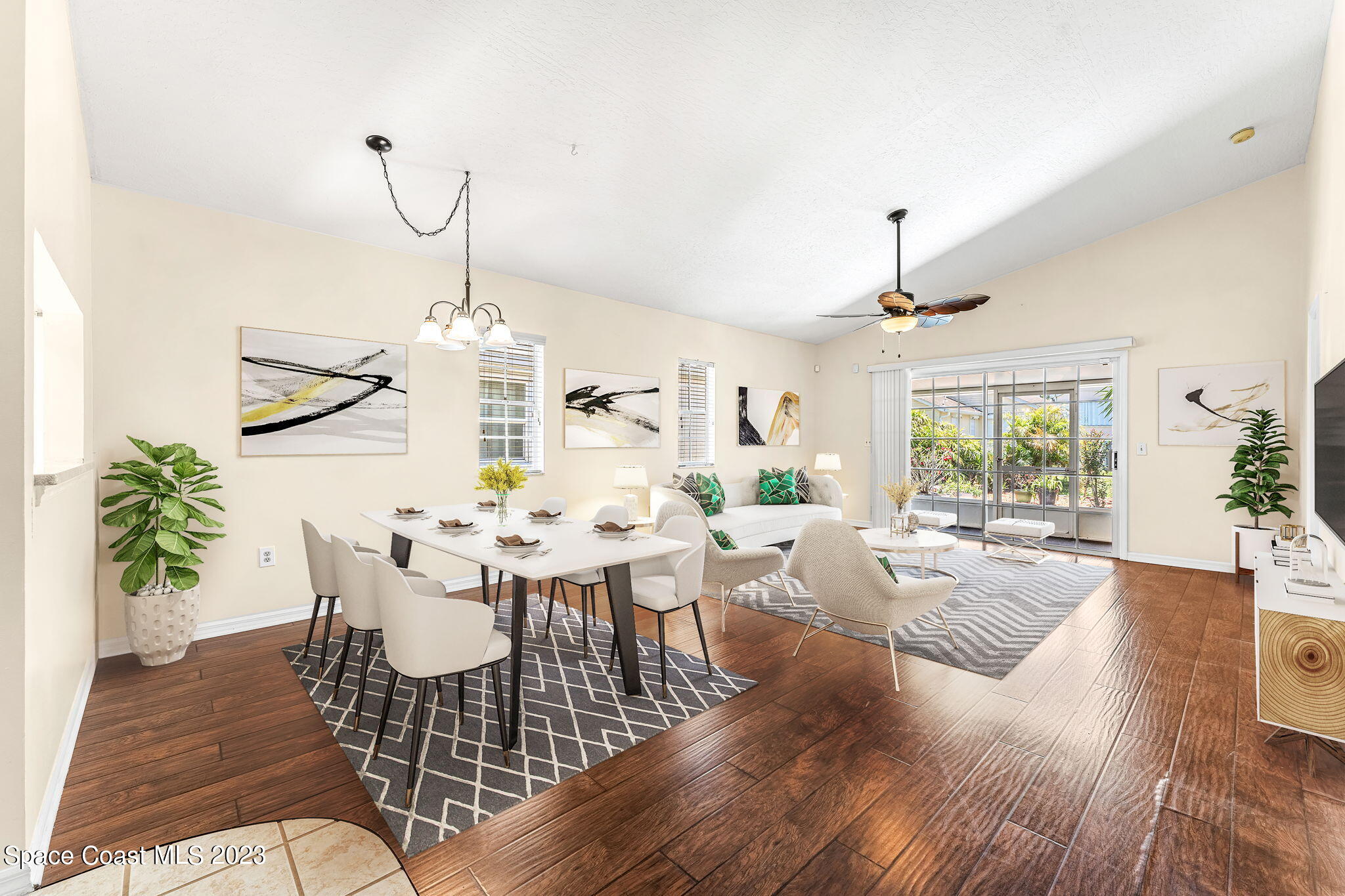 840 Cross Lake Drive Melbourne, FL 32901 - Photo 16 of 63 a view of a dining room with furniture window and wooden floor