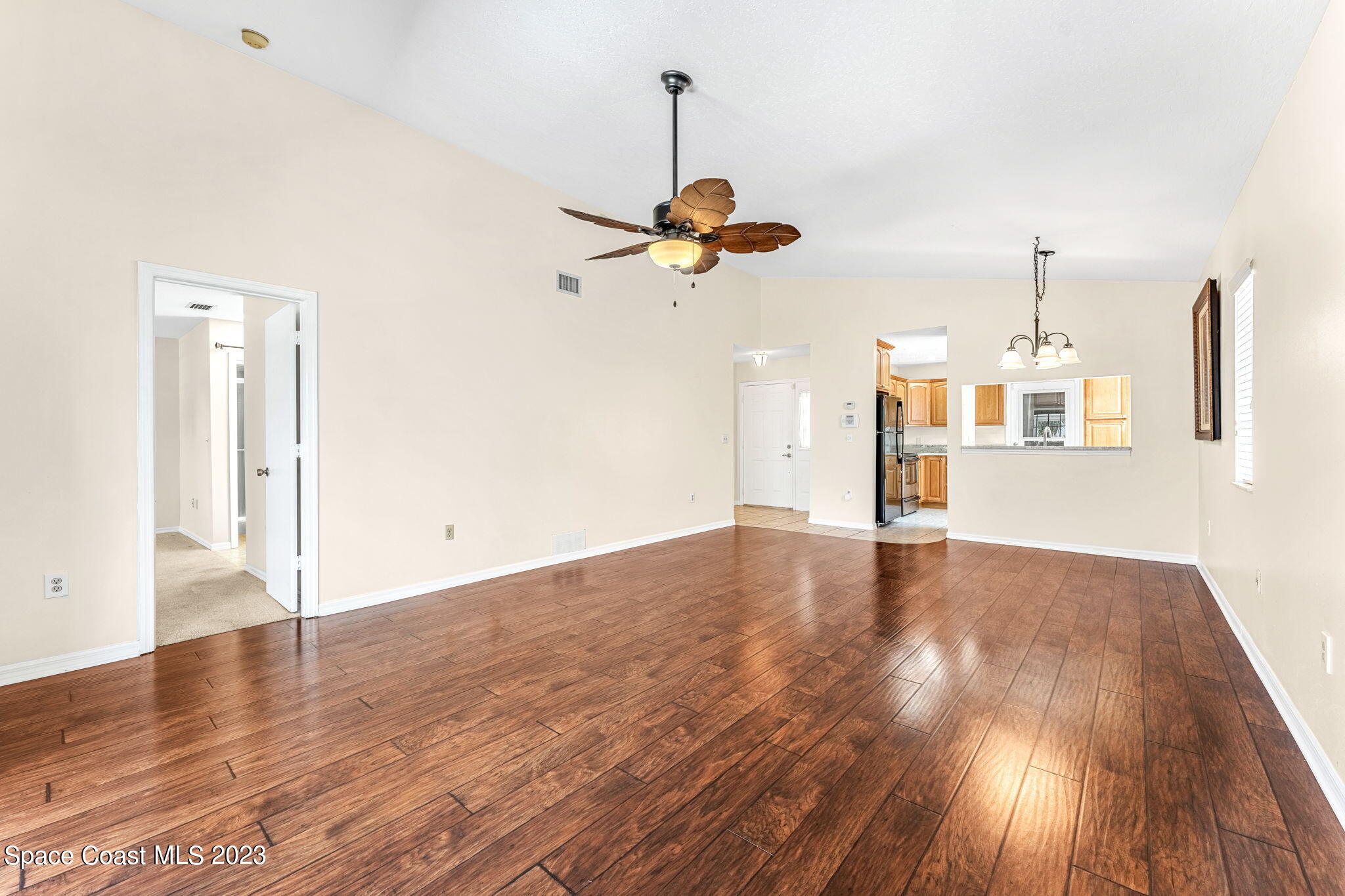 840 Cross Lake Drive Melbourne, FL 32901 - Photo 19 of 63 wooden floor in an empty room with a window