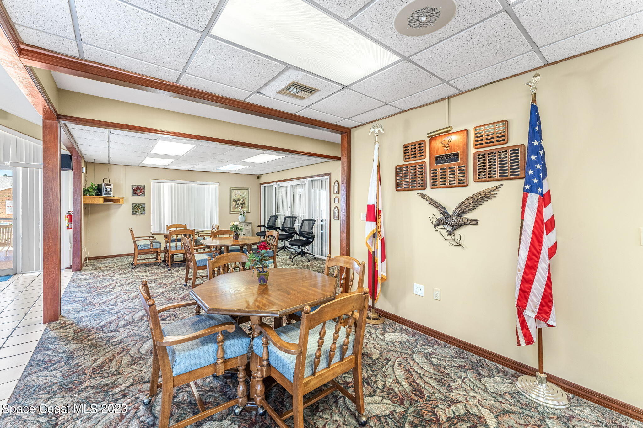 840 Cross Lake Drive Melbourne, FL 32901 - Photo 46 of 63 a dining room with furniture and window