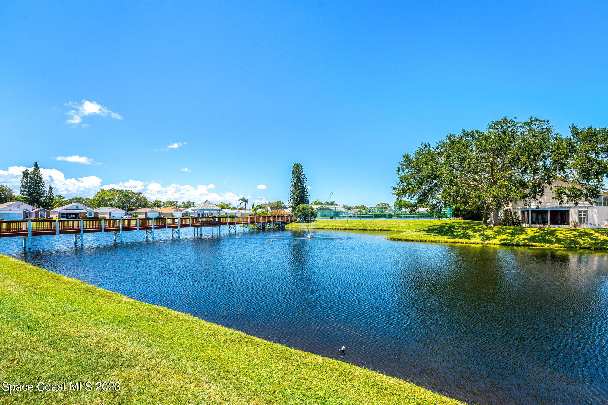 840 Cross Lake Drive Melbourne, FL 32901 - Photo 49 of 63 a view of a swimming pool and an ocean
