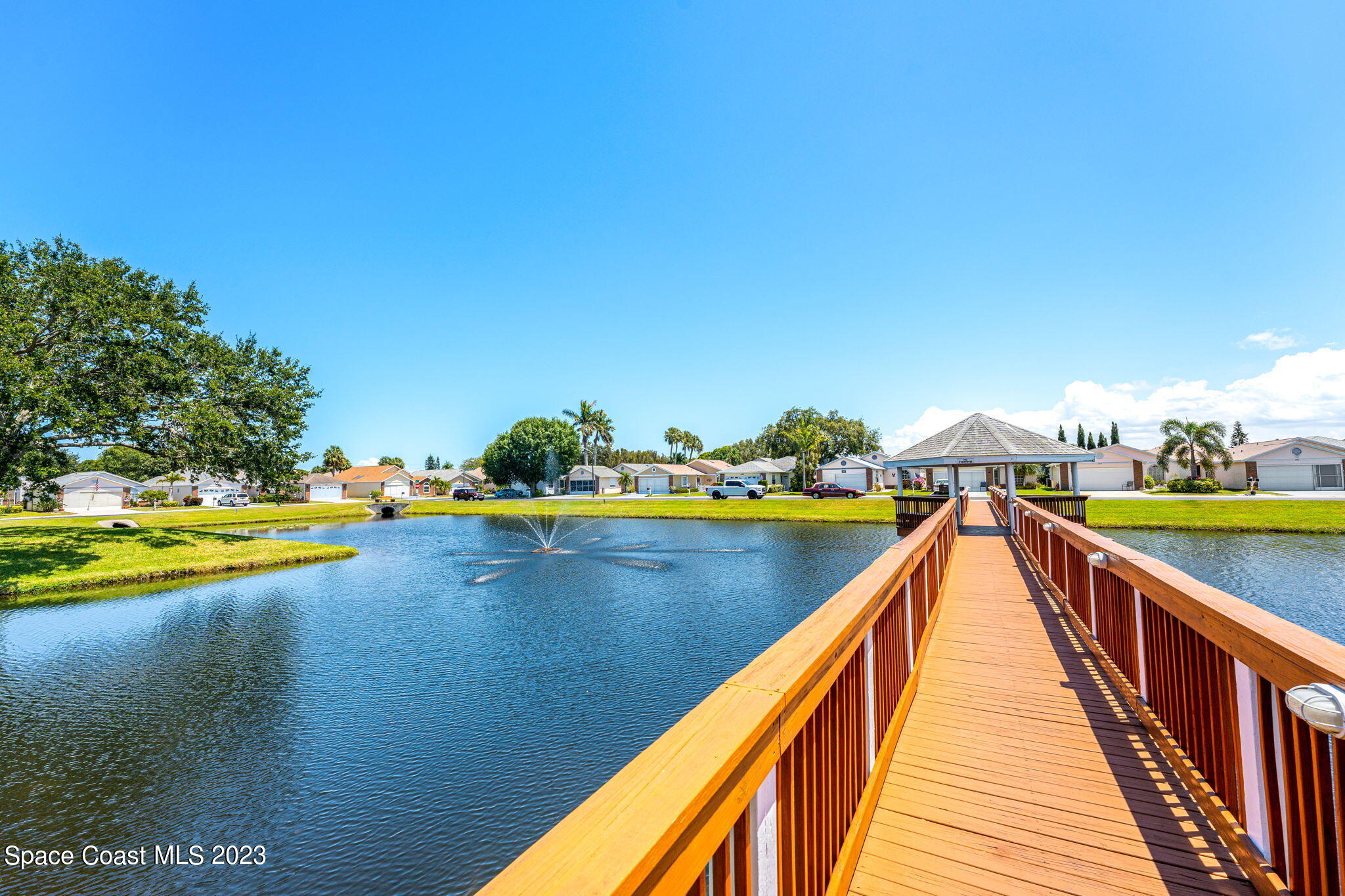 840 Cross Lake Drive Melbourne, FL 32901 - Photo 50 of 63 a view of swimming pool with outdoor seating and yard